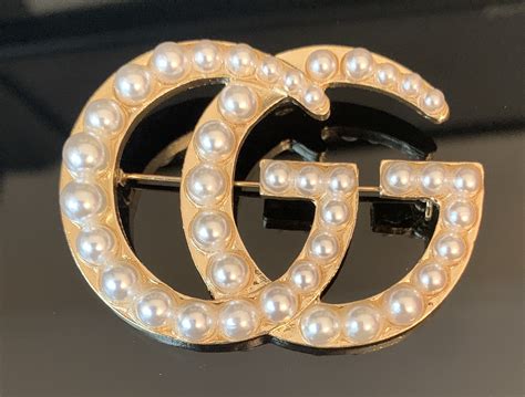 Gucci pins & brooches for Women .